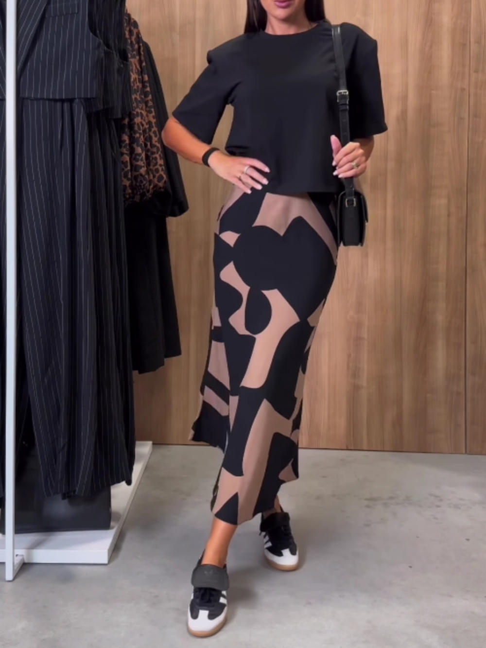 Black T-shirt and irregular printed skirt set